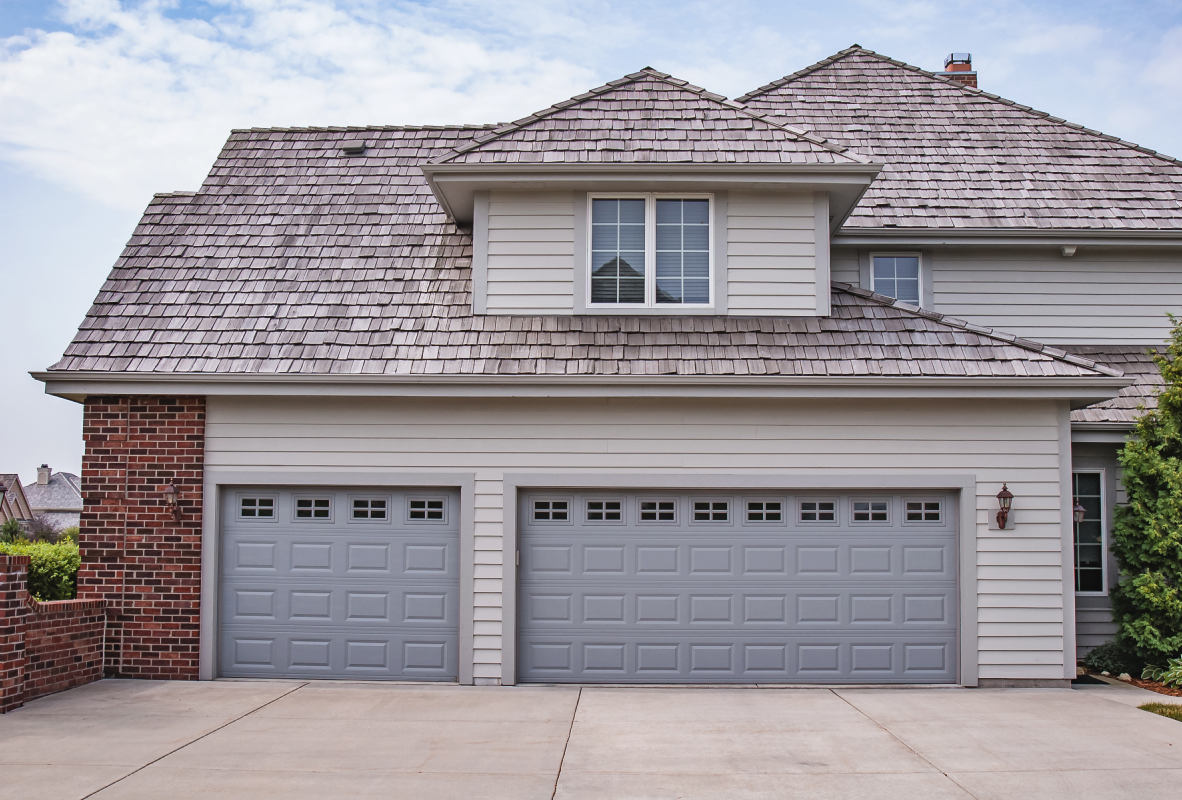 Raised panel garage doors in gray