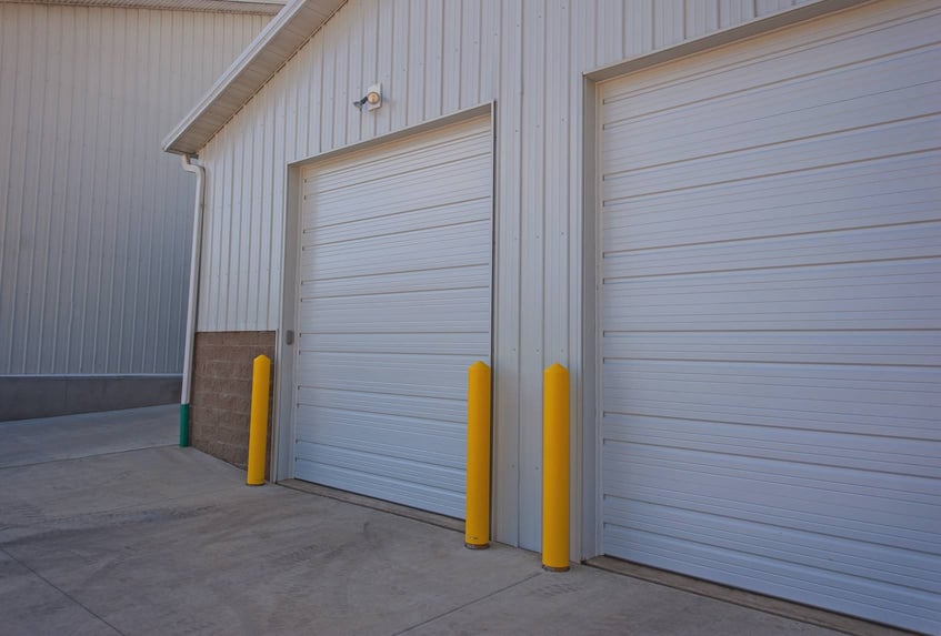 COMMERCIAL STEEL PANEL DOORS - Garage Doors - Ideal