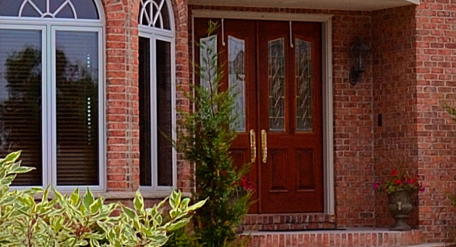 Close up of red front doors